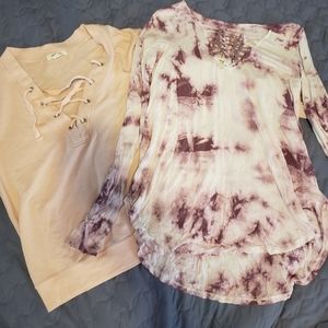 Two long sleeved shirts. Size XS/SM